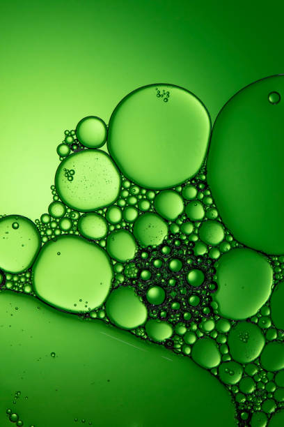 istock air bubbles in liquid green tone background 1306092234