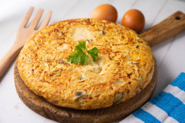 istock Traditional Spanish omelette with potatoes and zuuchini 1306092999