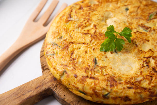 istock Traditional Spanish omelette with potatoes and zuuchini 1306093064