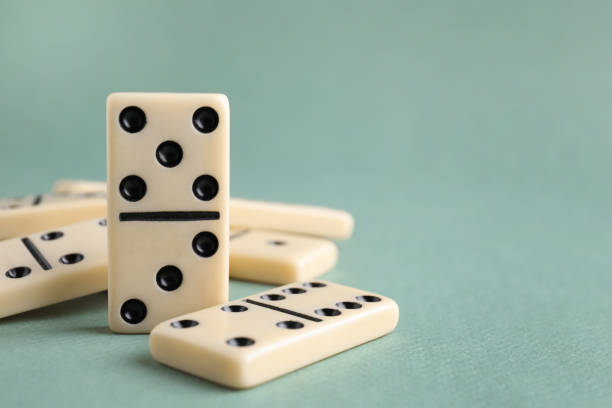 istock Classic domino tiles on grey background, closeup. Space for text 1306096454