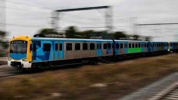 istock Commuter train approaching a train station in Melbourne Victoria Australia 1306097555