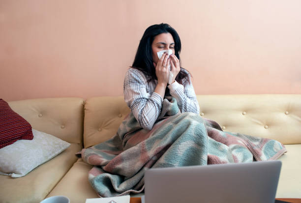 istock Infected woman at home 1306101135
