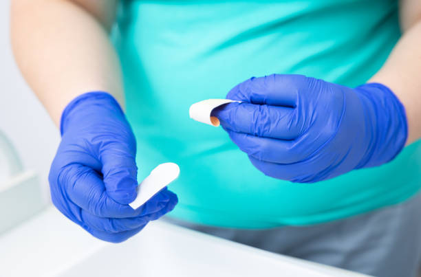 istock The nurse is holding an adhesive plaster. 1306105340