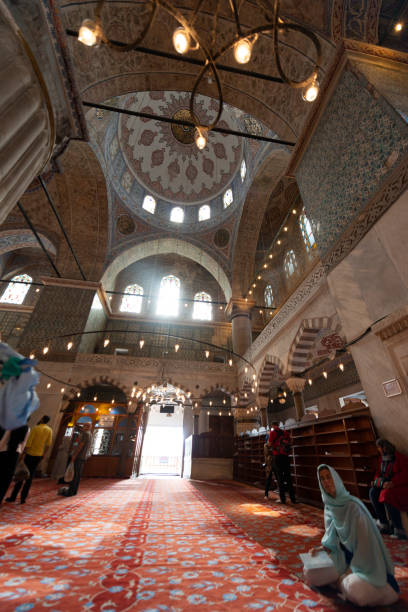 Interior of the Blue Mosque, Sultanahmet Mosque Istanbul, Turkey. Istanbul-Turkey - September, 11, 2016: People who visited and praying inside the Blue Mosque. turkey koran people design stock pictures, royalty-free photos & images