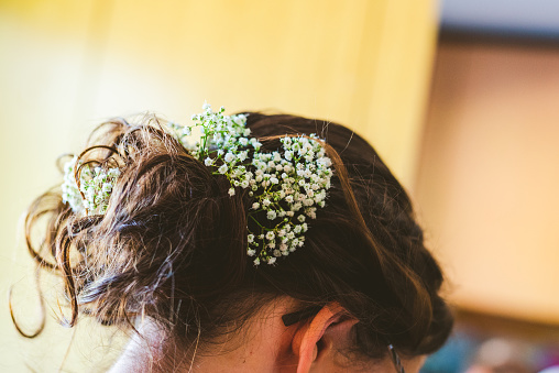 Gypsophila flower in bride's hair