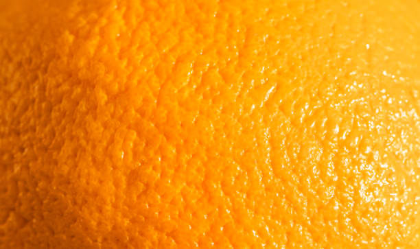 istock Ripe orange peel background. Close up view 1306111680