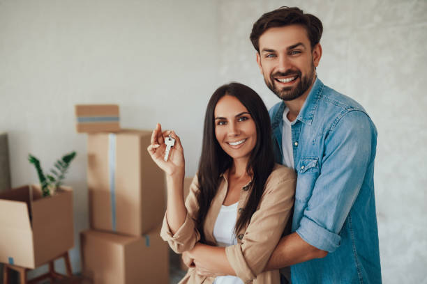 istock Excited young couple moving into a new home 1306117048