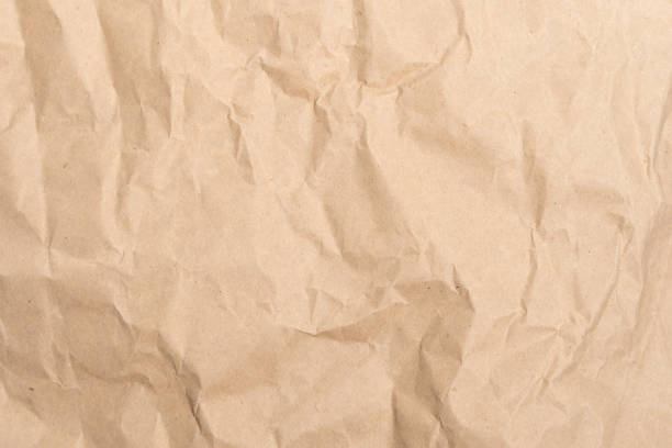 istock Crumpled Brown Paper Background 1306117197