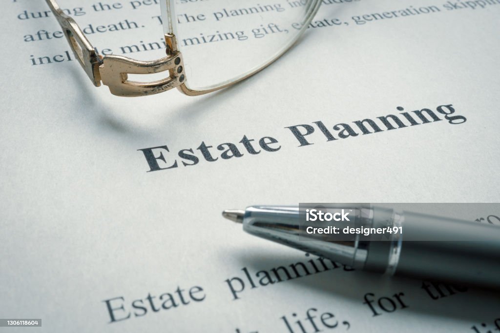 Information about Estate planning and old glasses. Will - Legal Document Stock Photo