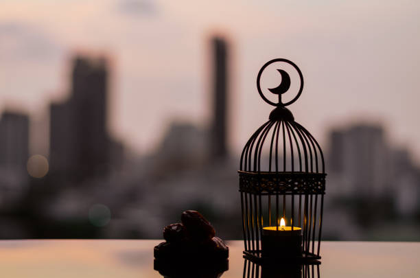 istock Lantern that have moon symbol on top and dates fruit for Ramadan Kareem. 1306119865