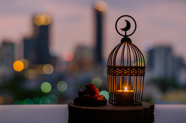istock Lantern that have moon symbol on top and dates fruit for Ramadan Kareem. 1306119866