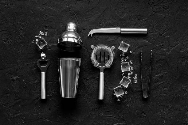 istock Bar tools and utensils for cocktail - with shaker, strainer and ice 1306120095