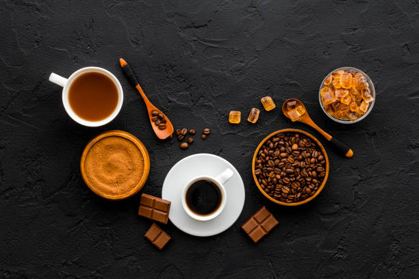 istock Background with assorted coffee and cocoa - beans with powder and hot drink 1306122567