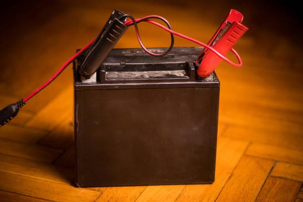 istock Motorcycle lead battery being charged 1306122948