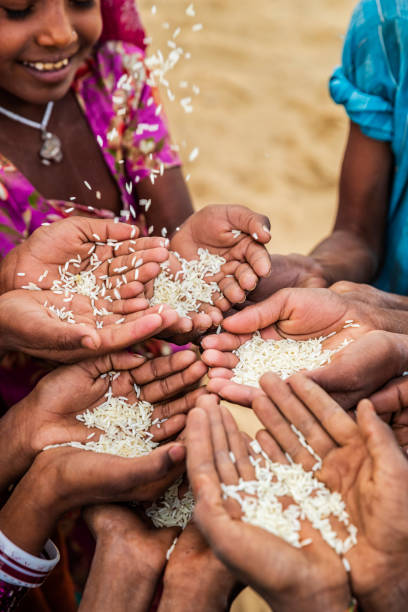 istock Poor Indian children asking for food, India 1306125753