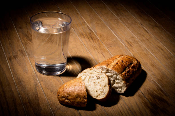Fasting for bread and water Fasting for bread and water to strengthen the spirit prison meal stock pictures, royalty-free photos & images