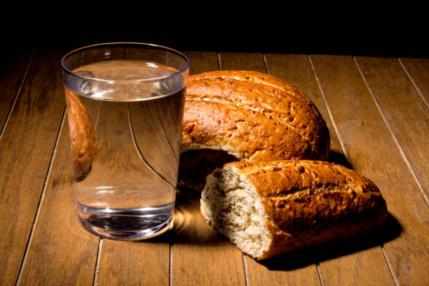 Fasting for bread and water Fasting for bread and water to strengthen the spirit prison meal stock pictures, royalty-free photos & images