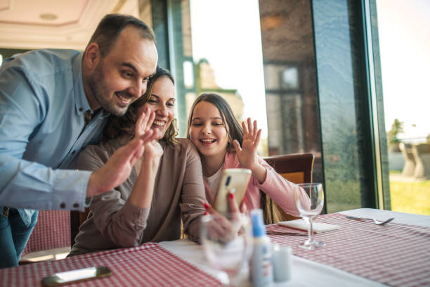 istock family having lunch at a restaurant 1306127782