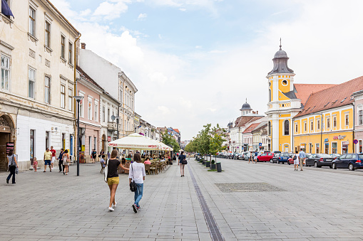 Cluj-Napoca, Romania - July 11, 2013: Eroilor Avenue, known as Bulevardul Eroilor in Romanian, is a pedestrianised area of the old town of Cluj-Napoca in Transylvania, Romania