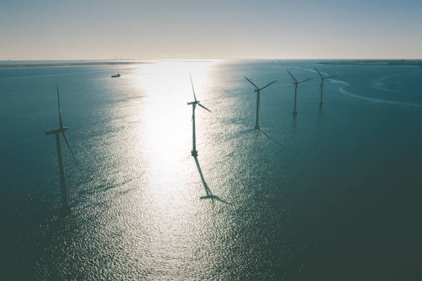 istock Wind turbines in the ocean 1306130048