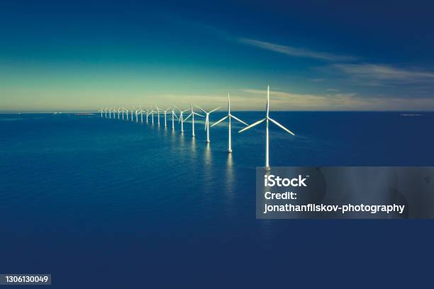 Wind Turbines In The Ocean Stock Photo - Download Image Now - Sustainable Resources, Wind Turbine, Sea