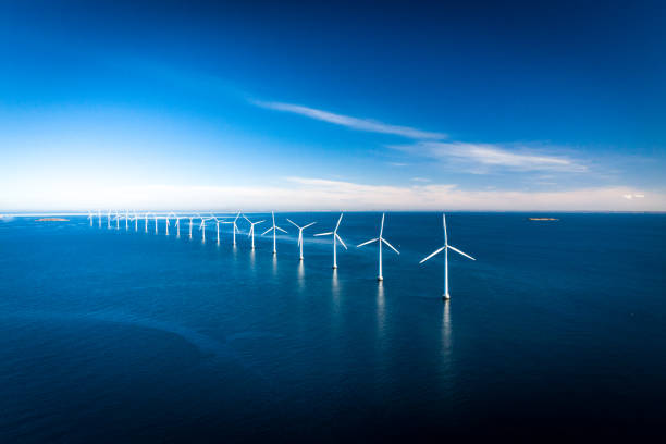 istock Wind turbines in the ocean 1306130566