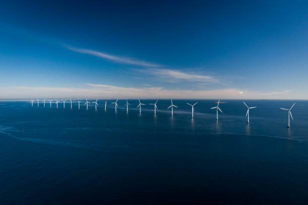 istock Wind turbines in the ocean 1306130593