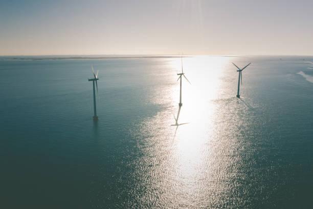 istock Wind turbines in the ocean 1306130673