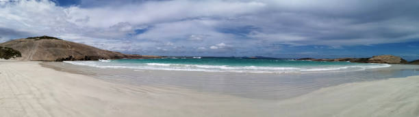 istock Stretch of sandy white beach 1306130763