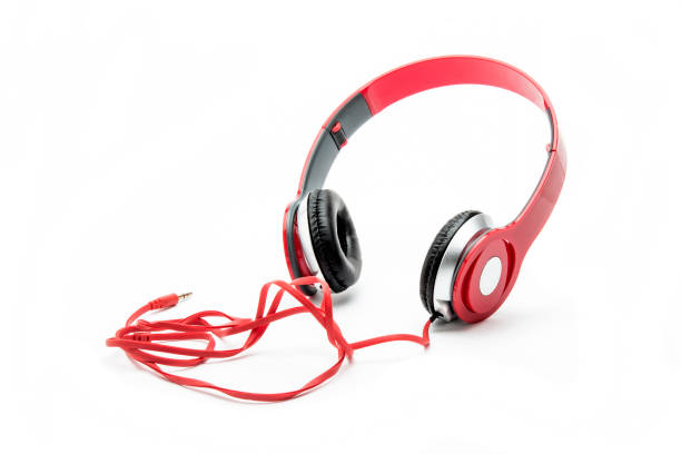 istock Red headphones on white background 1306131178