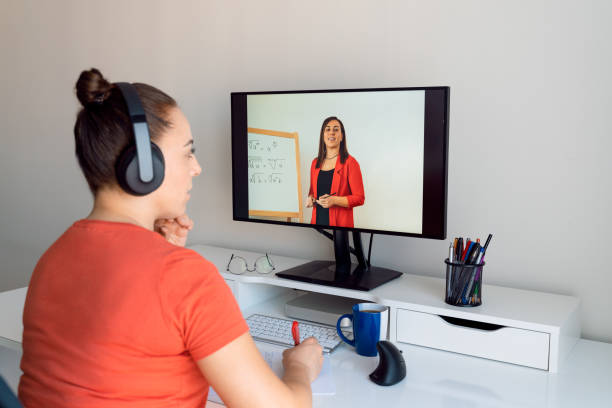 istock Girl student taking online lessons from math teacher notes important points 1306132301