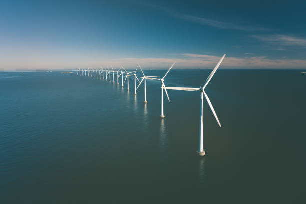 istock Wind turbines in the ocean 1306132480