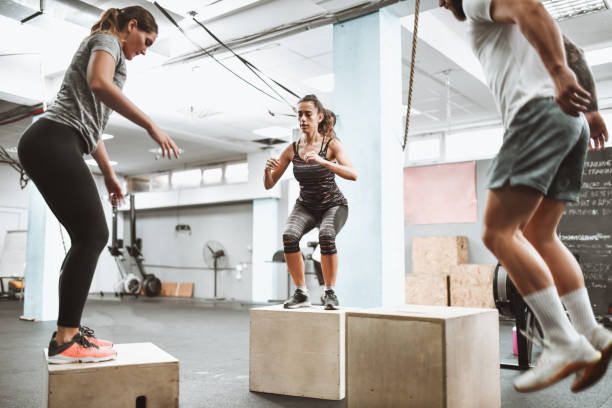 istock Athletes In Gym Competing In Jumping 1306136329