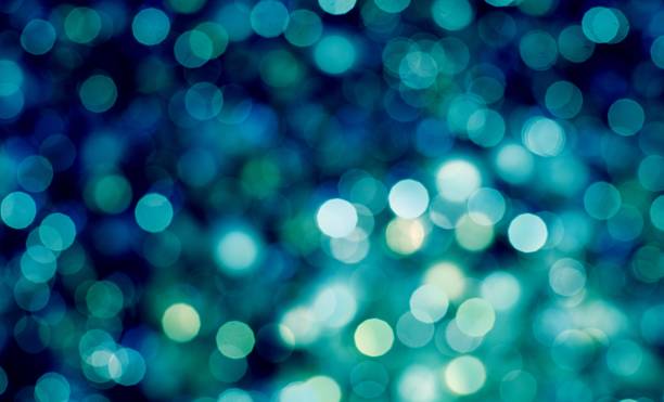 istock Abstract bokeh pastel background. Bokeh light, shimmering blur spot lights on multicolored abstract background 1306137798