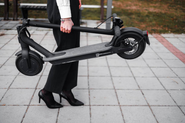 istock A young woman with electric scooter 1306138684