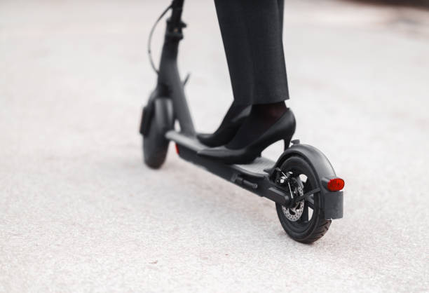 istock A young woman with electric scooter 1306138741