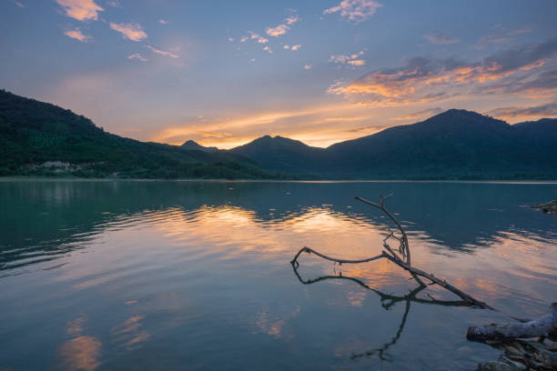 istock Sunset by Am Chua lake 1306138843