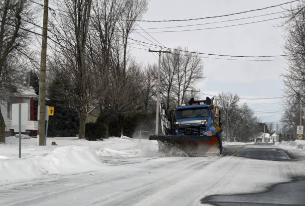 istock Snowplow clearing the road 1306139266