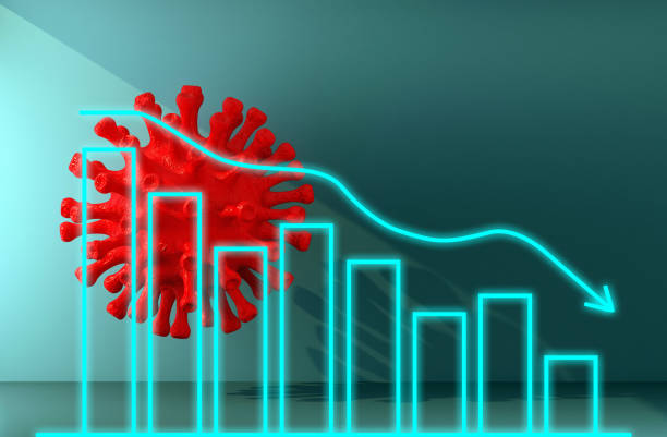 istock red coronavirus bacteria lit by ray of light with chart shows decline 1306141398