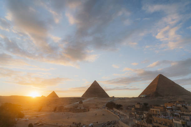 istock Scenic view of Giza pyramids at sunset 1306141423