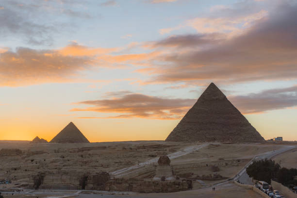 istock Scenic view of Giza pyramids at sunset 1306141440