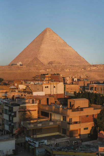 istock Scenic view of Giza pyramids at sunset 1306141497