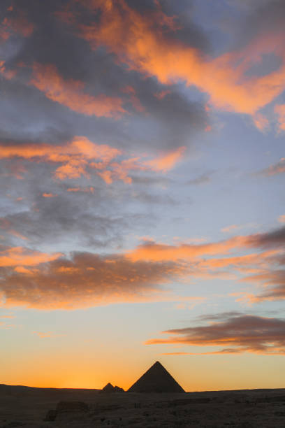 istock Scenic view of Giza pyramids at sunset 1306141507