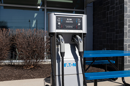 Indianapolis - Circa March 2021: Eaton EV charging station. Eaton offers electric vehicle xChargeIn stations in four sizes.