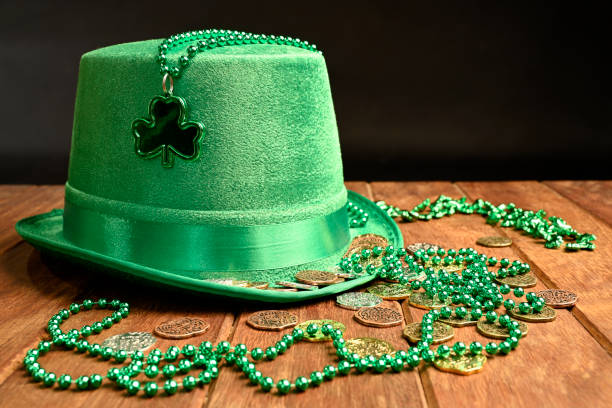 istock Green hat, necklaces and lucky coins 1306143375