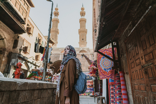 Portrait of woman  walking in the old town market in  Cairo