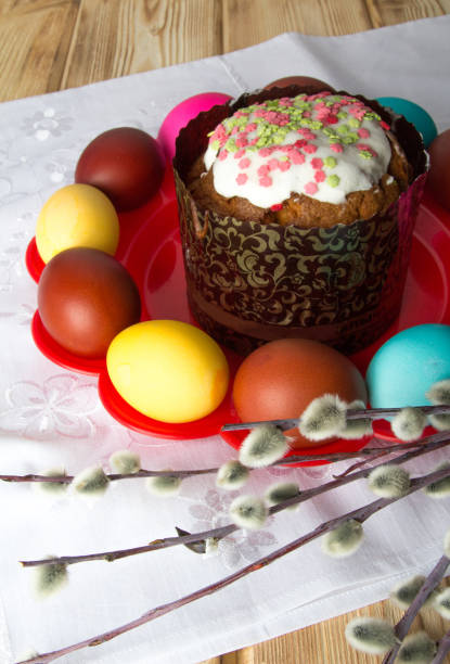 istock Easter cake on a red stand with colored eggs . The concept of celebrating Easter 1306151274