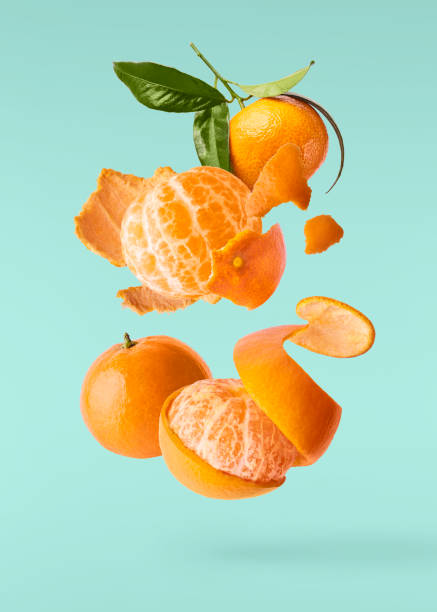 Fresh ripe mandarine on white background. stock photo