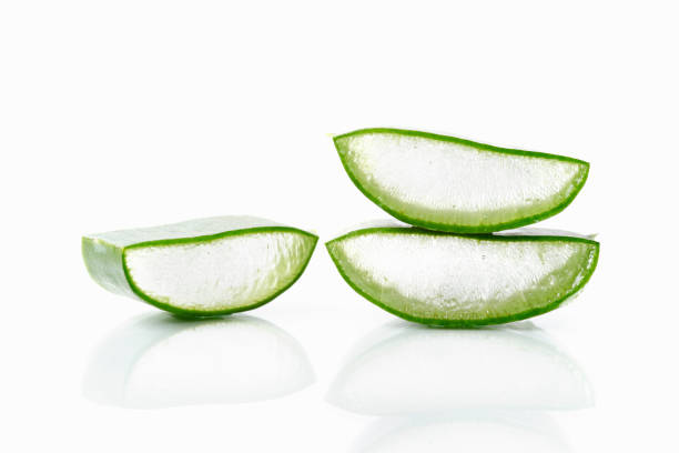 istock Sliced green aloe vera plant on white background 1306154292