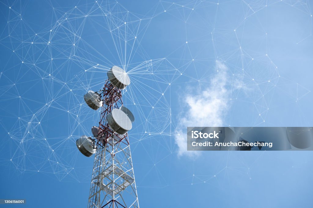 Telecommunication tower with mesh dots, glittering particles for wireless telecommunication technology Communications Tower Stock Photo
